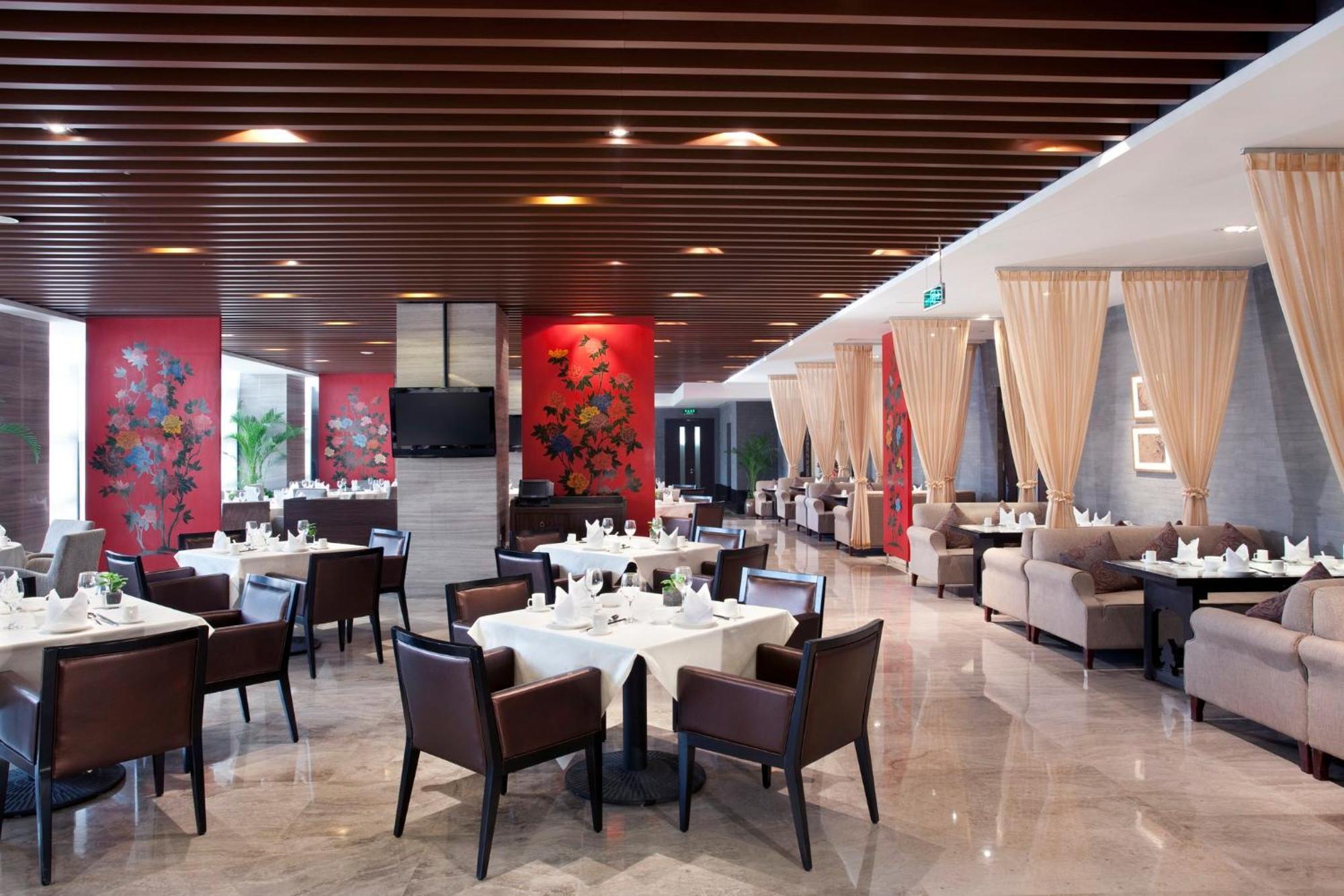 Holiday Inn Beijing Deshengmen By Ihg On 2Nd Ring Road Extension 10-15 Minute Taxi Ride To Shichahai Lama Temple Drum Tower Close To Beijing North Station For Badaling Great Wall Near Exit B Jishuitan Metro Line 2 المظهر الخارجي الصورة